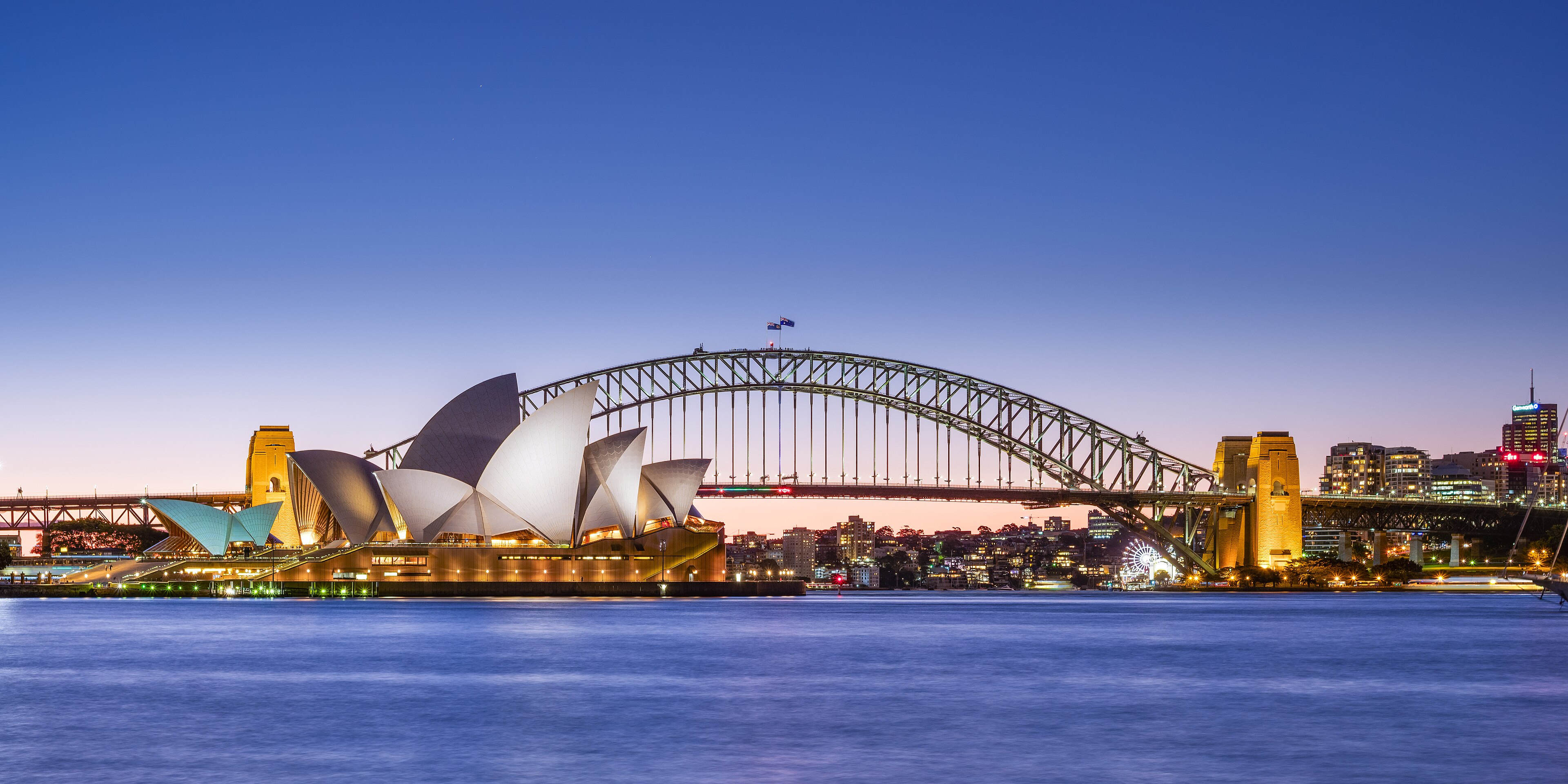 Sydney Opera House and Harbour Bridge at dusk for the AI agency service area page